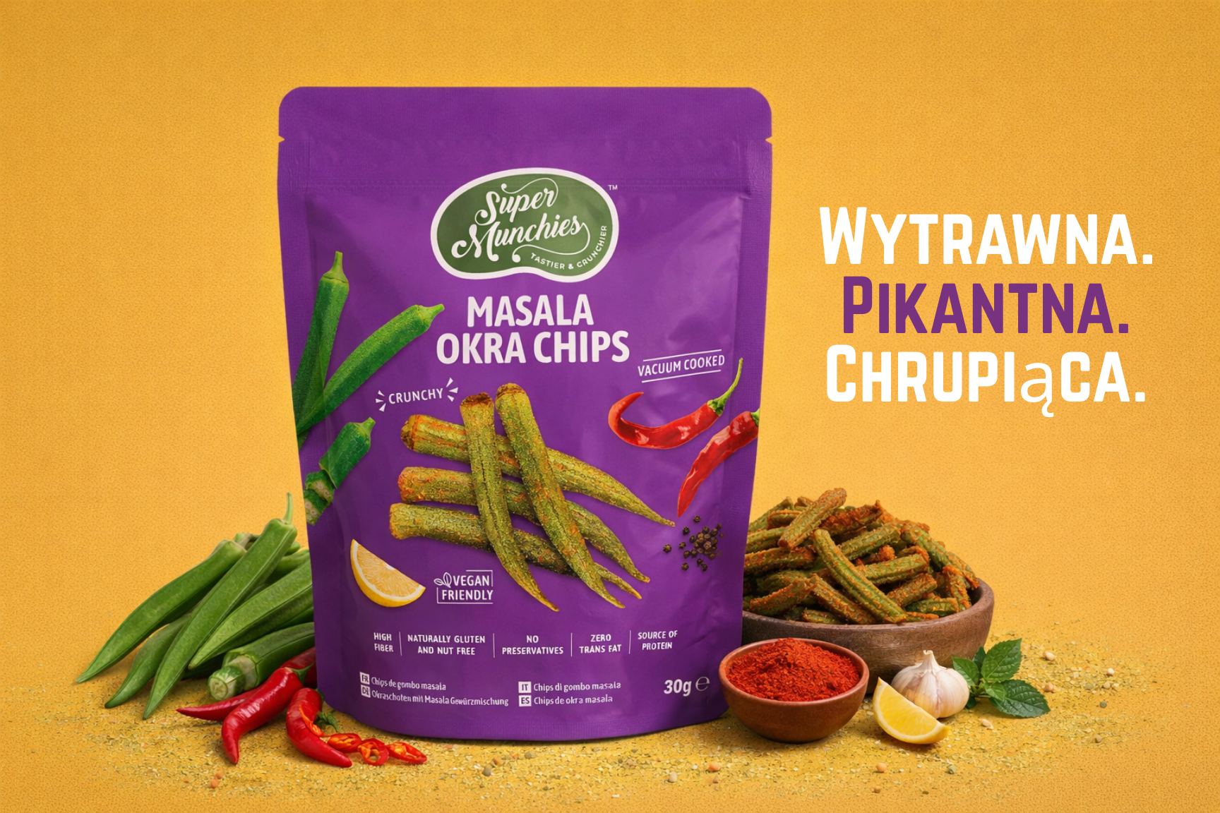 Chipsy z okry Masala Super Munchies 30 g, pikantne chrupiące chipsy gotowane próżniowo na pomarańczowym tle z papryczkami chili i cytryną